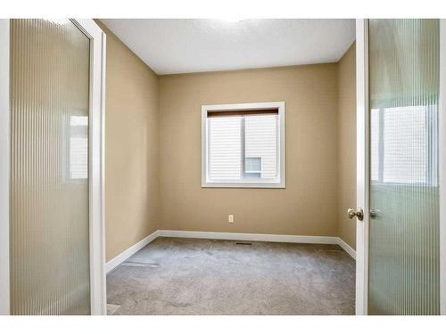 60 Westmount Way, Okotoks, AB - Indoor Photo Showing Other Room