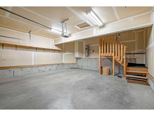 60 Westmount Way, Okotoks, AB - Indoor Photo Showing Garage