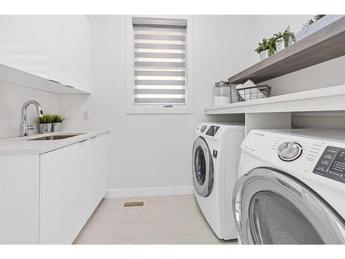 2406 35 Street Sw, Calgary, AB - Indoor Photo Showing Laundry Room