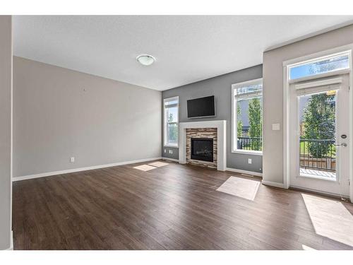 91 Nolancrest Circle Nw, Calgary, AB - Indoor Photo Showing Living Room With Fireplace