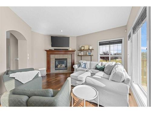 148 Seagreen Manor, Chestermere, AB - Indoor Photo Showing Living Room With Fireplace