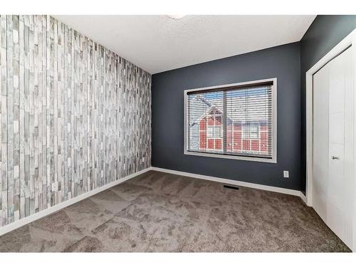 228 Marquis Lane Se, Calgary, AB - Indoor Photo Showing Other Room