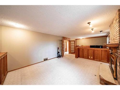 16 Ridgegate Way Sw, Airdrie, AB - Indoor Photo Showing Other Room