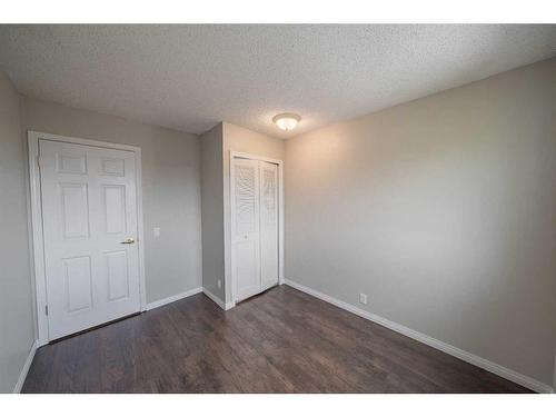 16 Ridgegate Way Sw, Airdrie, AB - Indoor Photo Showing Other Room