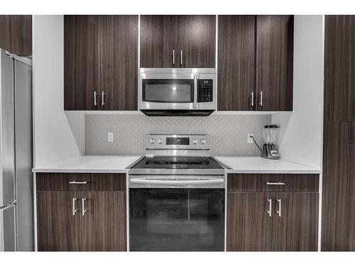 104-95 Skyview Close Ne, Calgary, AB - Indoor Photo Showing Kitchen