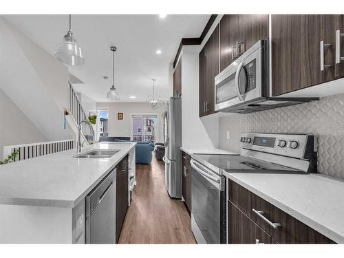 104-95 Skyview Close Ne, Calgary, AB - Indoor Photo Showing Kitchen With Stainless Steel Kitchen With Double Sink With Upgraded Kitchen