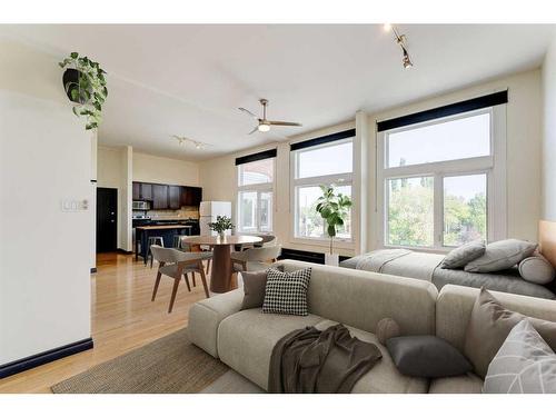 209-812 8 Street Se, Calgary, AB - Indoor Photo Showing Living Room