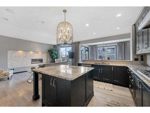 1026 Evanston Drive Nw, Calgary, AB - Indoor Photo Showing Kitchen With Fireplace