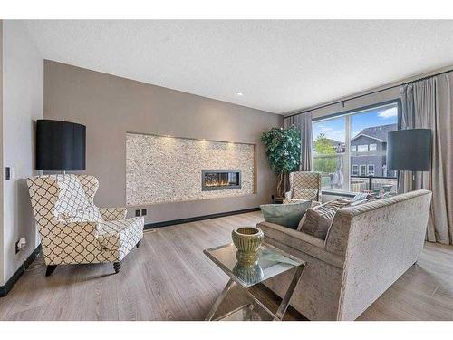 1026 Evanston Drive Nw, Calgary, AB - Indoor Photo Showing Living Room With Fireplace