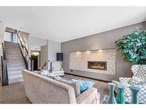 1026 Evanston Drive Nw, Calgary, AB - Indoor Photo Showing Living Room With Fireplace