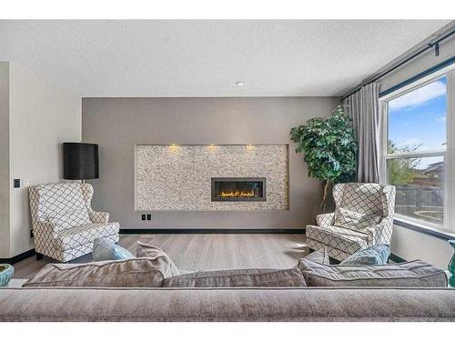 1026 Evanston Drive Nw, Calgary, AB - Indoor Photo Showing Living Room With Fireplace