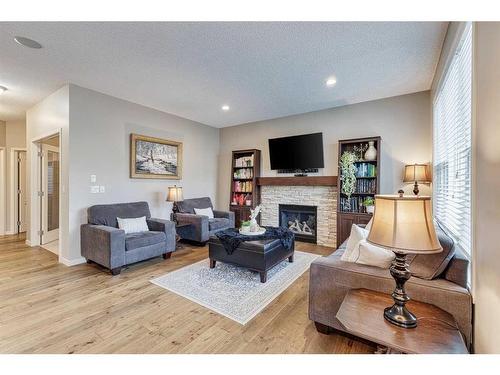 1212 Brightoncrest Common Se, Calgary, AB - Indoor Photo Showing Living Room With Fireplace