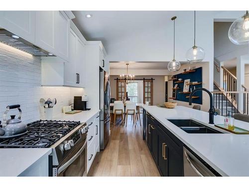 354 Mountain Park Drive Se, Calgary, AB - Indoor Photo Showing Kitchen With Double Sink With Upgraded Kitchen