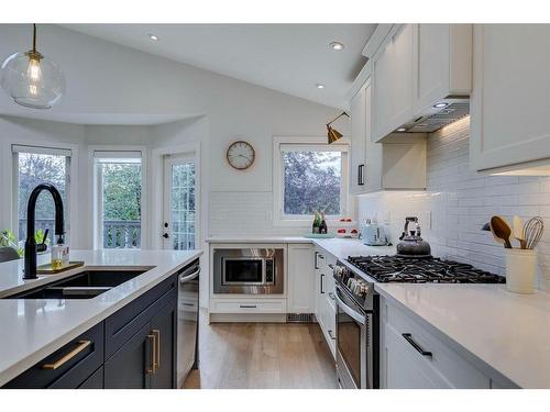 354 Mountain Park Drive Se, Calgary, AB - Indoor Photo Showing Kitchen With Double Sink With Upgraded Kitchen