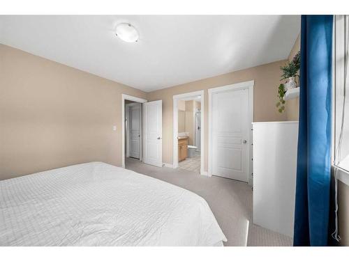 271 Cranston Drive Se, Calgary, AB - Indoor Photo Showing Bedroom