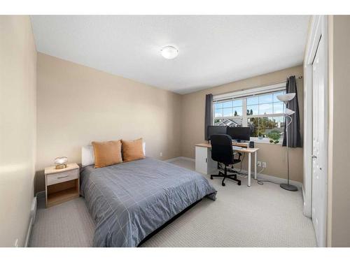 271 Cranston Drive Se, Calgary, AB - Indoor Photo Showing Bedroom