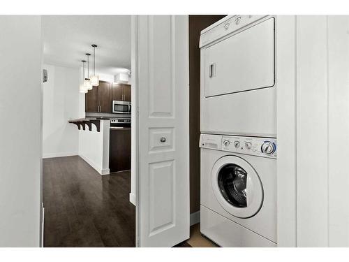 304-10 Panatella Road Nw, Calgary, AB - Indoor Photo Showing Laundry Room