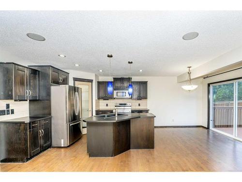 415 Cranston Drive Se, Calgary, AB - Indoor Photo Showing Kitchen With Stainless Steel Kitchen