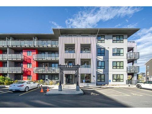 1110-350 Livingston Common Ne, Calgary, AB - Outdoor With Balcony With Facade