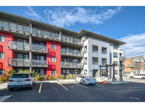 1110-350 Livingston Common Ne, Calgary, AB - Outdoor With Balcony With Facade