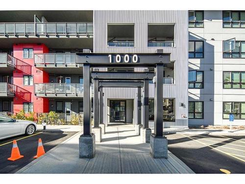 1110-350 Livingston Common Ne, Calgary, AB - Outdoor With Balcony With Facade