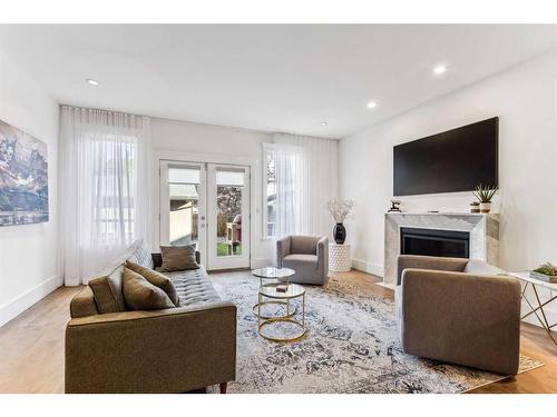 1934 47 Avenue Sw, Calgary, AB - Indoor Photo Showing Living Room With Fireplace