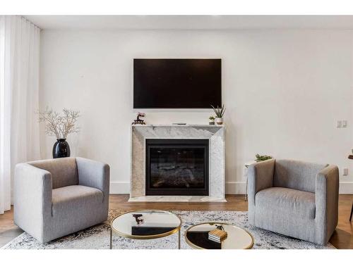 1934 47 Avenue Sw, Calgary, AB - Indoor Photo Showing Living Room With Fireplace