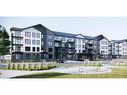 1113-100 Bannister Drive, Okotoks, AB  - Outdoor With Balcony With Facade 