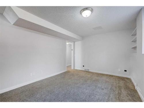 126 Springs Court Se, Airdrie, AB - Indoor Photo Showing Other Room