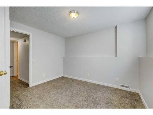 126 Springs Court Se, Airdrie, AB - Indoor Photo Showing Other Room