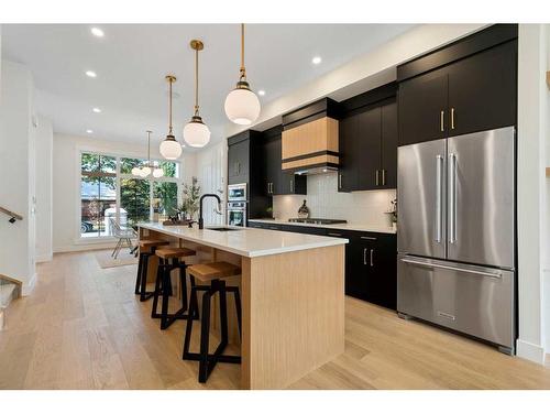 1112A Regent Crescent Ne, Calgary, AB - Indoor Photo Showing Kitchen With Stainless Steel Kitchen With Upgraded Kitchen