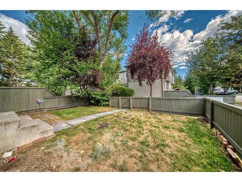 16-4936 Dalton Drive Nw, Calgary, AB - Outdoor With Backyard