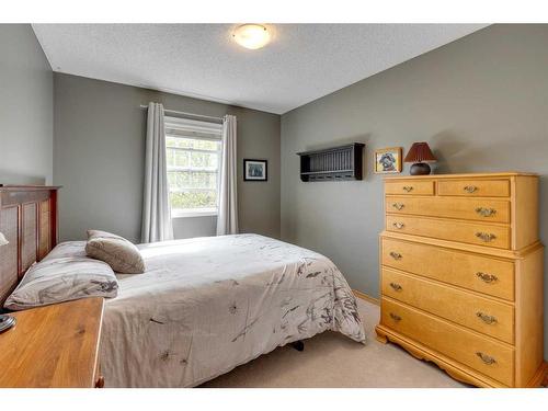 151 Riverview Circle Se, Calgary, AB - Indoor Photo Showing Bedroom