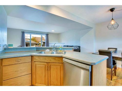 2266 Passchendaele Avenue Sw, Calgary, AB - Indoor Photo Showing Kitchen With Double Sink