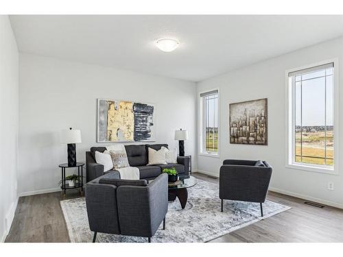 160 Carringham Way Nw, Calgary, AB - Indoor Photo Showing Living Room