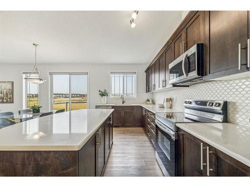 160 Carringham Way Nw, Calgary, AB - Indoor Photo Showing Kitchen With Upgraded Kitchen