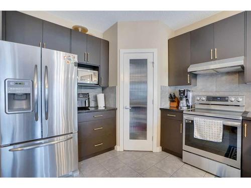 23 Everwoods Park Sw, Calgary, AB - Indoor Photo Showing Kitchen With Stainless Steel Kitchen