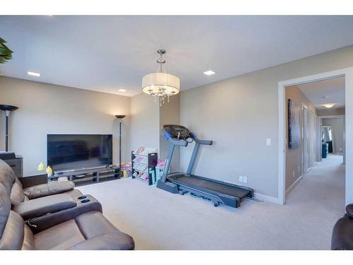 23 Everwoods Park Sw, Calgary, AB - Indoor Photo Showing Gym Room