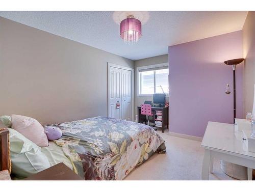 23 Everwoods Park Sw, Calgary, AB - Indoor Photo Showing Bedroom