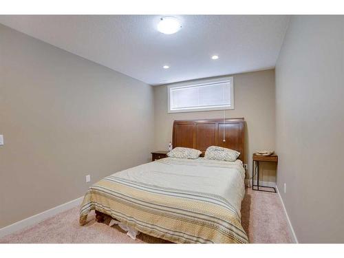 23 Everwoods Park Sw, Calgary, AB - Indoor Photo Showing Bedroom