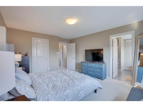 23 Everwoods Park Sw, Calgary, AB - Indoor Photo Showing Bedroom