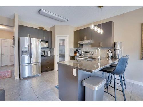 23 Everwoods Park Sw, Calgary, AB - Indoor Photo Showing Kitchen With Stainless Steel Kitchen