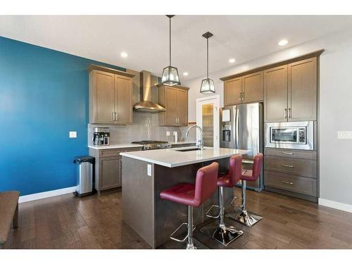 138 Baywater Way Sw, Airdrie, AB - Indoor Photo Showing Kitchen With Stainless Steel Kitchen With Upgraded Kitchen