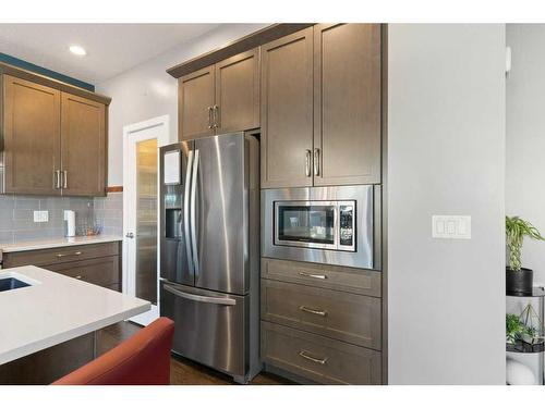 138 Baywater Way Sw, Airdrie, AB - Indoor Photo Showing Kitchen With Stainless Steel Kitchen