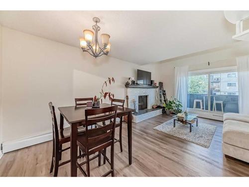 303-730 2 Avenue Nw, Calgary, AB - Indoor With Fireplace