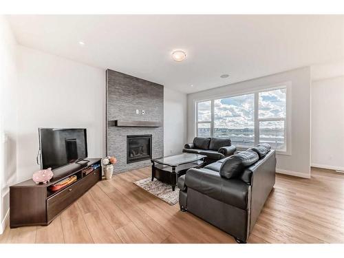 628 West Lakeview Dr Drive, Chestermere, AB - Indoor Photo Showing Living Room With Fireplace