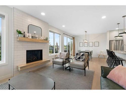 55 Shawnee Heath Sw, Calgary, AB - Indoor Photo Showing Living Room With Fireplace