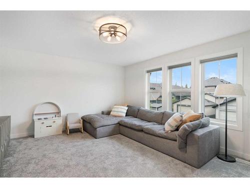 55 Shawnee Heath Sw, Calgary, AB - Indoor Photo Showing Living Room