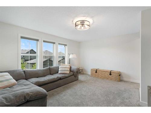 55 Shawnee Heath Sw, Calgary, AB - Indoor Photo Showing Living Room