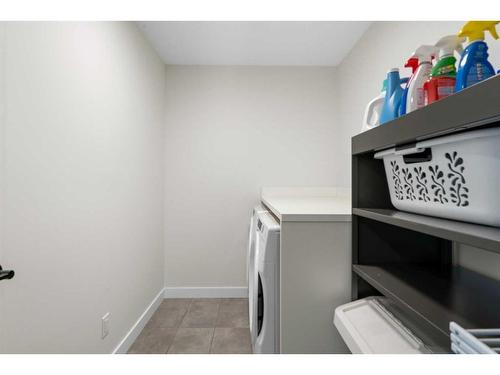 55 Shawnee Heath Sw, Calgary, AB - Indoor Photo Showing Laundry Room